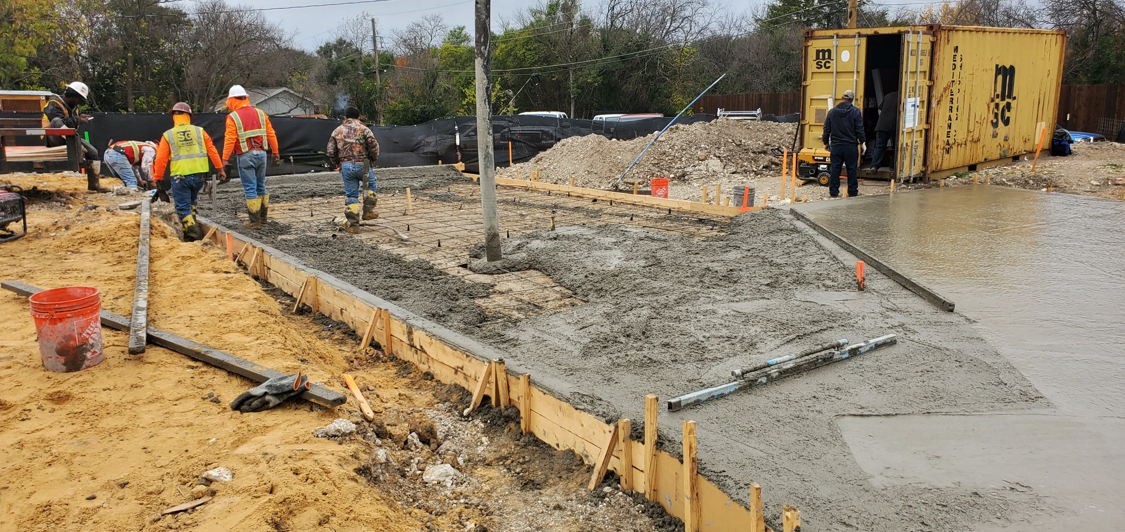 Foundations · Concrete placement in progress